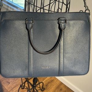 Slate blue Coach briefcase with adjustable shoulder strap